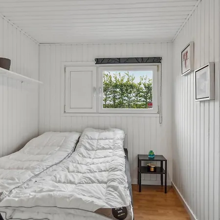 Three-bedroom In Hébergement de vacances *